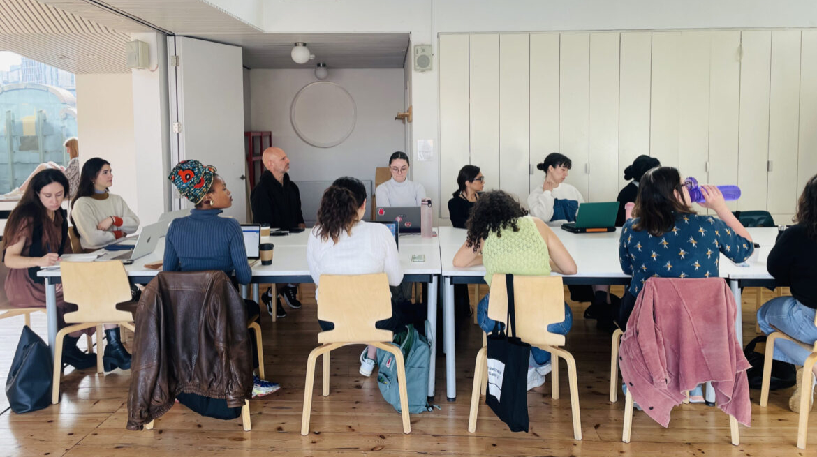 Group of students around a table.