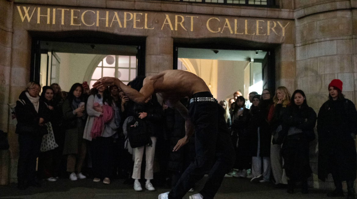 Topless dancer outside whitechapel gallery